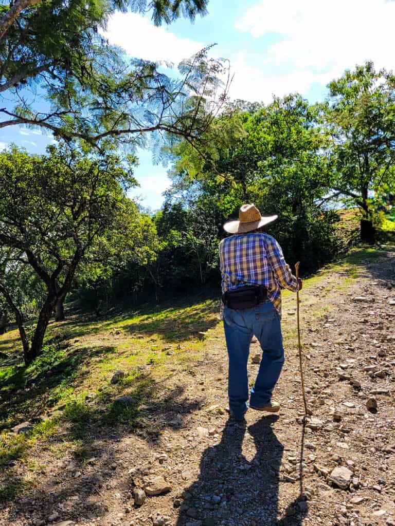 Hector my Monte Albán guide climbing the stony path to the ruins.
