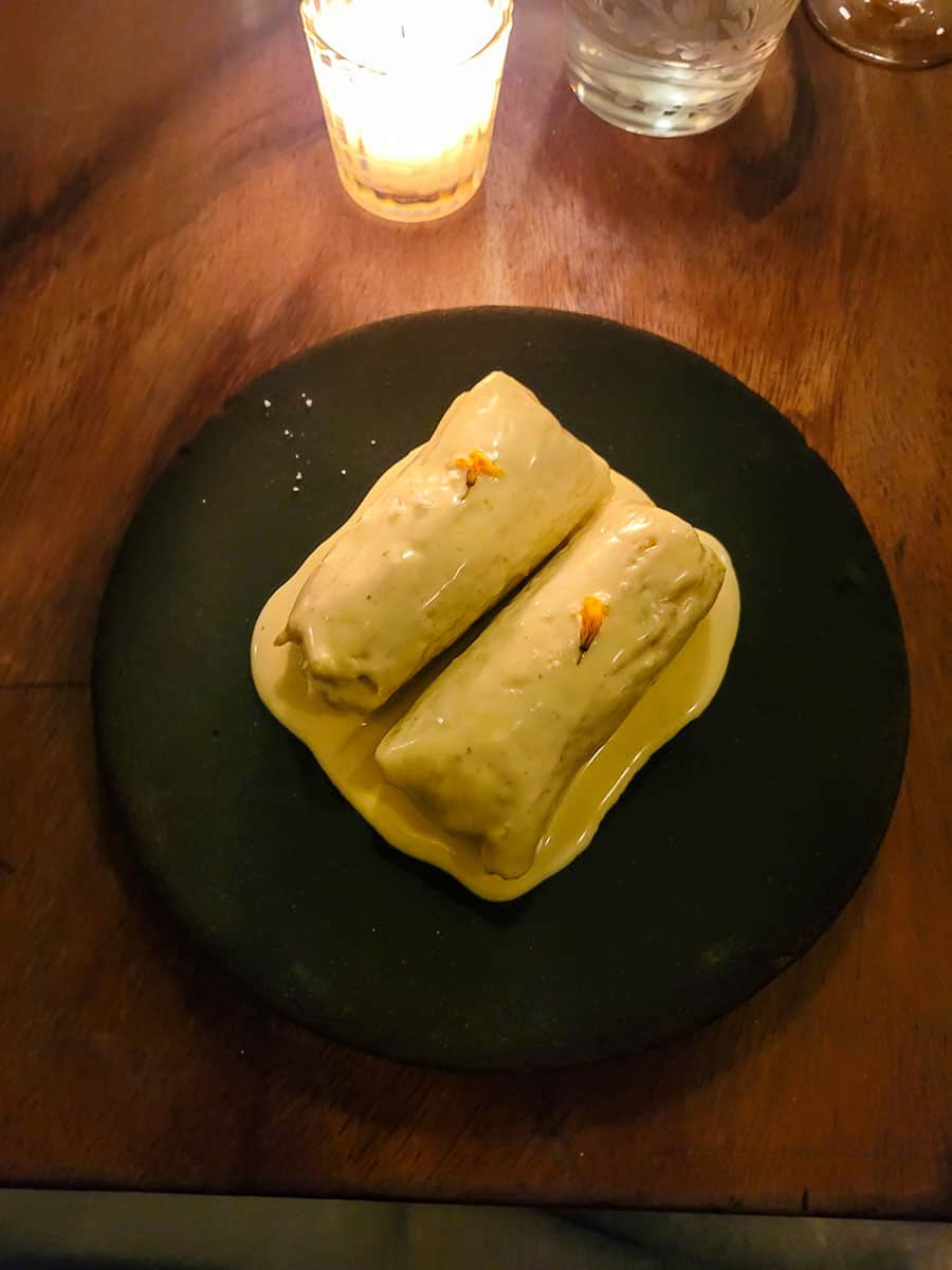Corn tamales with celeriac and smoked cream by candlelight at Restaurante Rosetta.