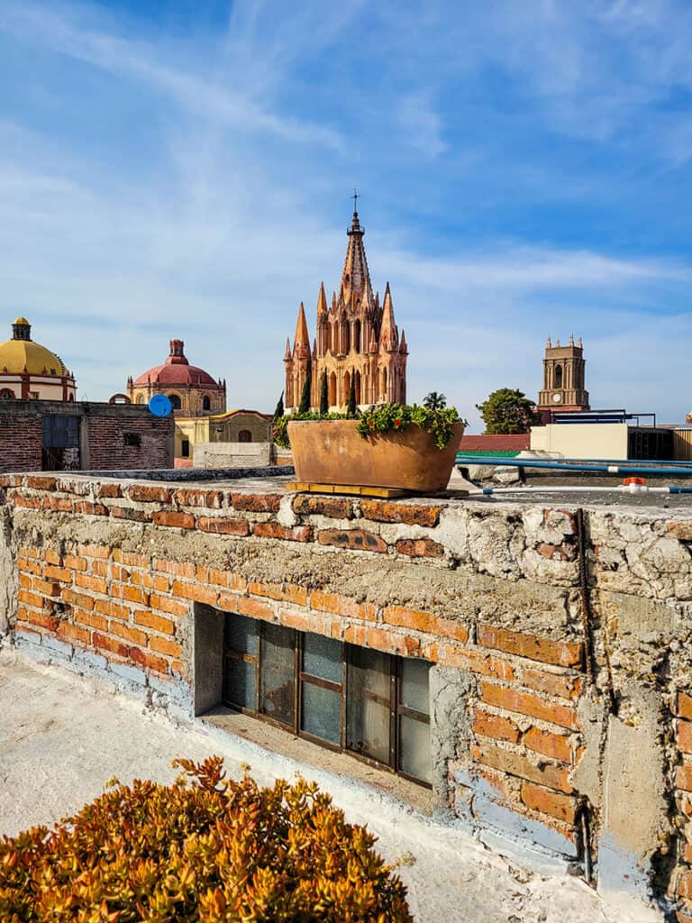 The view of the spires of San Miguel de Allende from Ki'bok Coffee SMA rooftop.