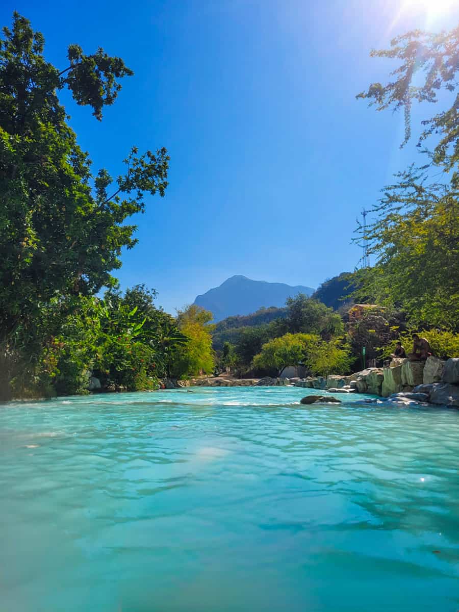 A view of the mountains and brush from the hot springs at Grutas Tolantongo.