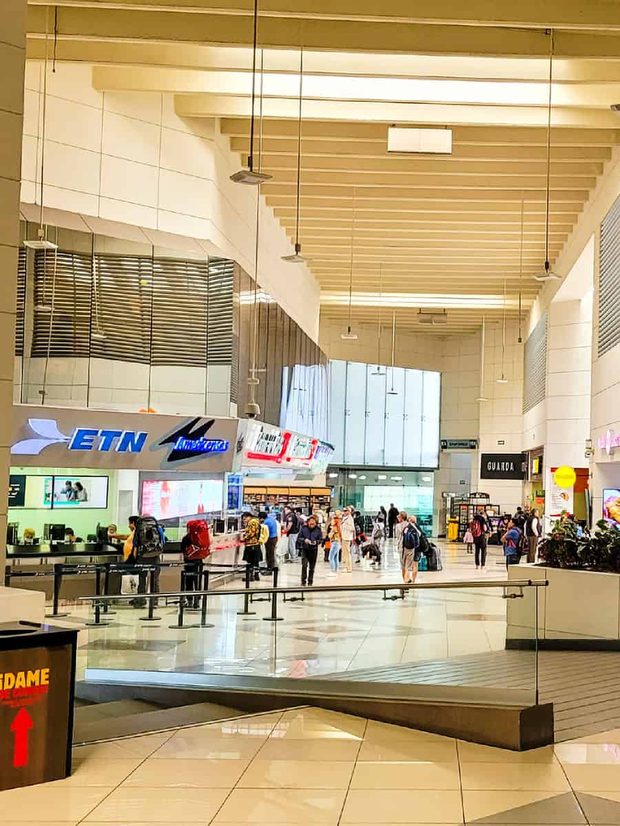 Queretaro Bus Terminal with ticket windows, restaurants, and shops.